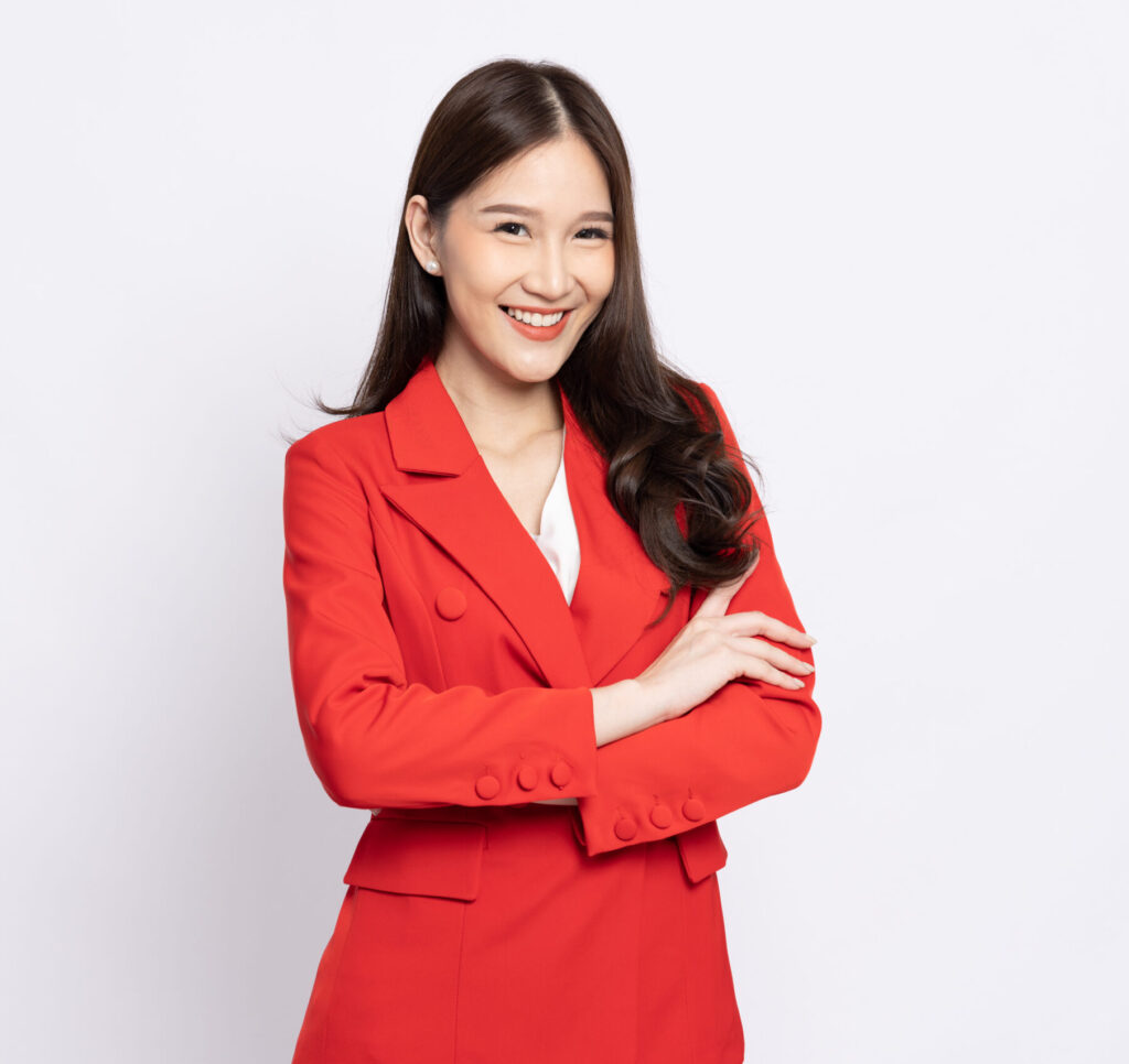 business asian women red suit with arms crossed smile isolated white background scaled e1700030842739